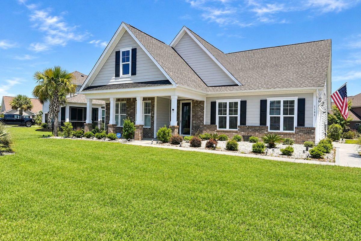 A craftsman style home with a covered front porch in Brighton Lakes